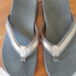 Brown and gold sandals